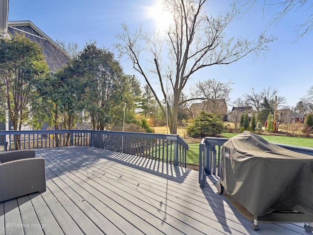 wooden terrace with area for grilling