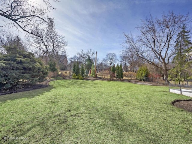 view of yard featuring fence