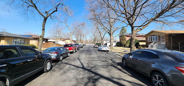 view of road with a residential view