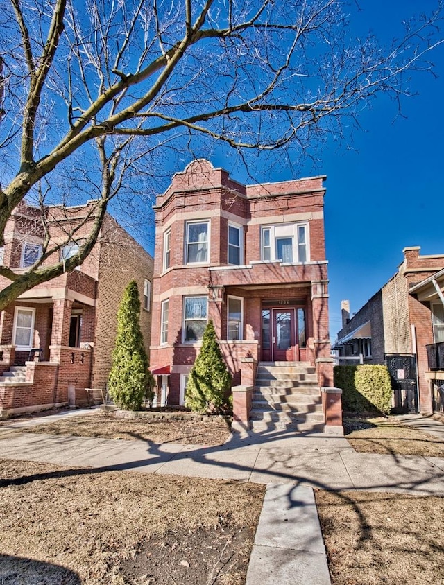 view of front of home with brick siding