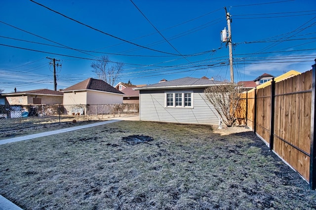 view of yard with a fenced backyard