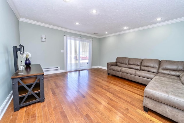 living area featuring light wood-type flooring, a baseboard radiator, a textured ceiling, and crown molding