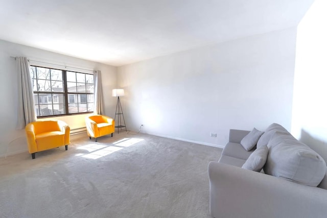 living area with carpet, baseboards, and baseboard heating