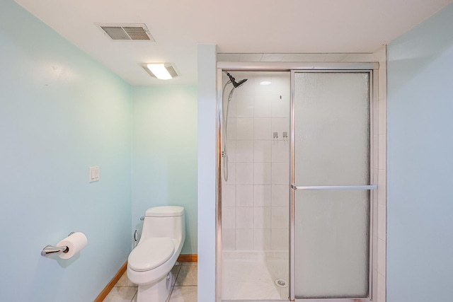 bathroom featuring visible vents, toilet, and a stall shower