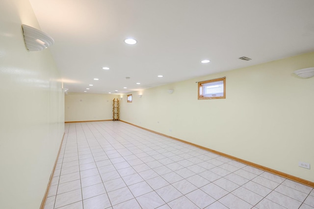 basement featuring recessed lighting, visible vents, and baseboards