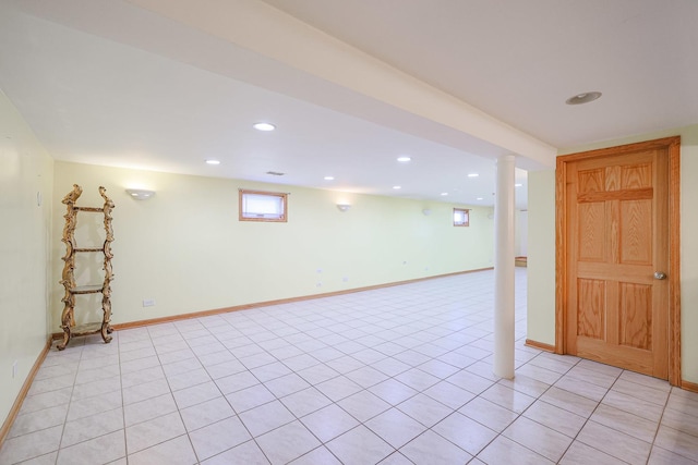 spare room featuring recessed lighting, baseboards, and light tile patterned flooring