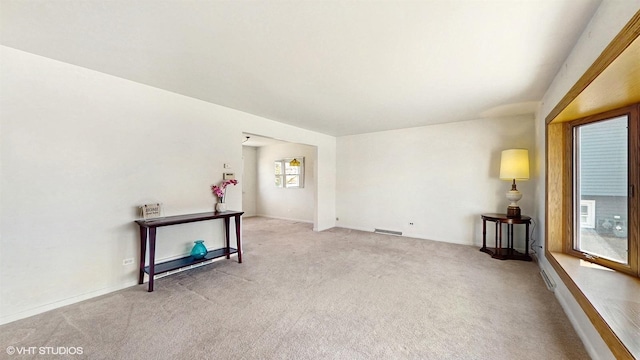 empty room featuring carpet floors