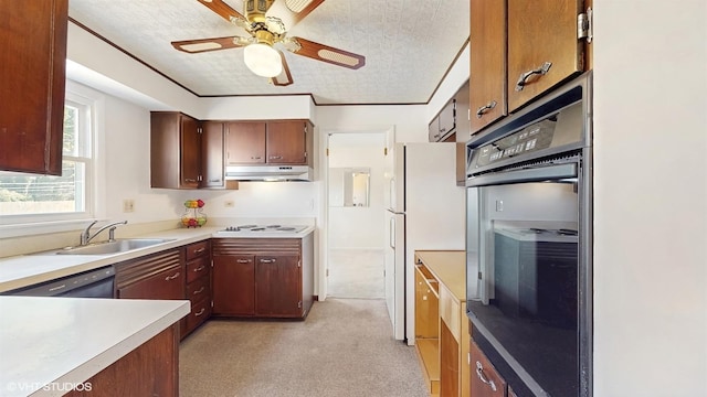 kitchen featuring white appliances, ceiling fan, a sink, light countertops, and under cabinet range hood