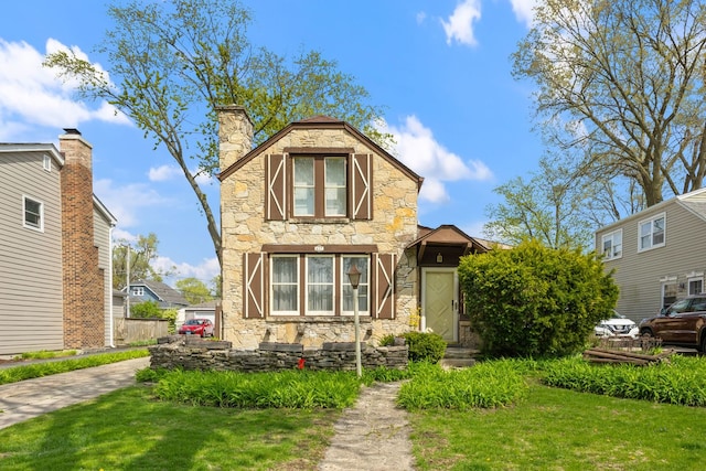 417 S Stewart Ave, Lombard, IL 60148 - traditional home featuring a front lawn and stone siding