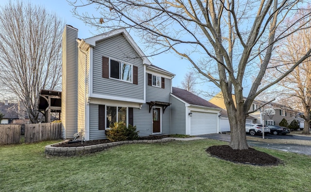 view of front of property featuring fence, a chimney, a front lawn, a garage, and aphalt driveway