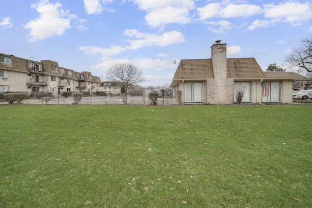 view of yard with fence