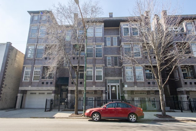 view of building exterior featuring fence