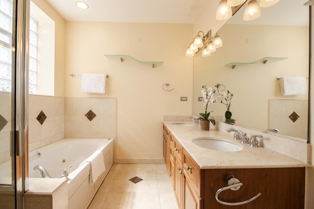 bathroom featuring a sink, baseboards, double vanity, and a whirlpool tub