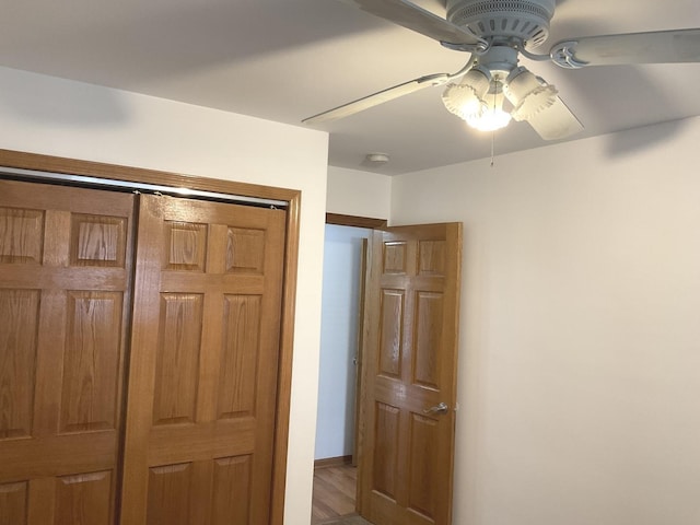 unfurnished bedroom featuring ceiling fan