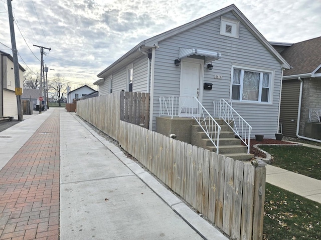 view of front facade with fence