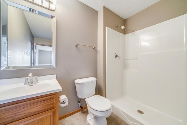 bathroom with toilet, tile patterned floors, a textured ceiling, vanity, and a shower