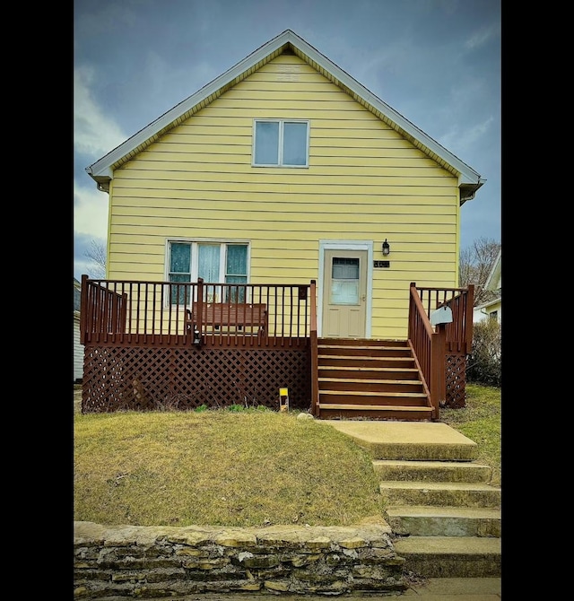 rear view of house with a deck