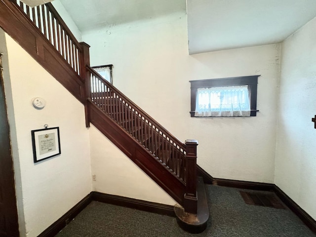 stairs with baseboards