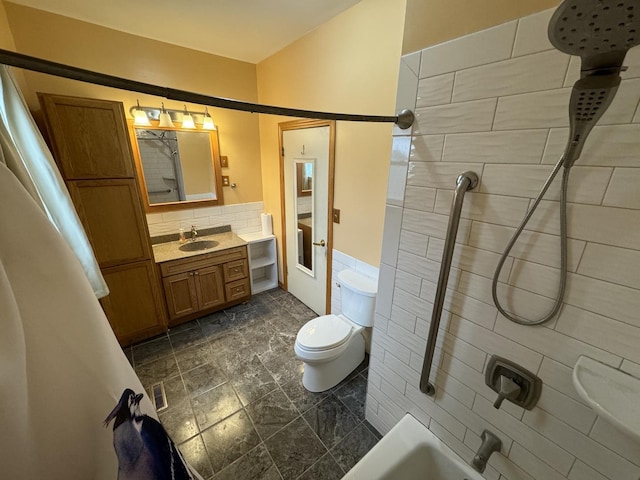 full bathroom featuring visible vents, toilet, backsplash, vanity, and shower / bathtub combination