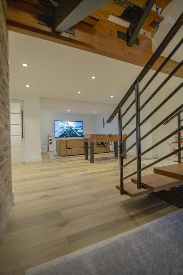 interior space featuring recessed lighting and wood finished floors