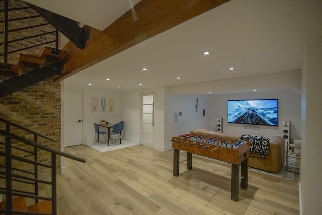 playroom featuring recessed lighting and wood finished floors