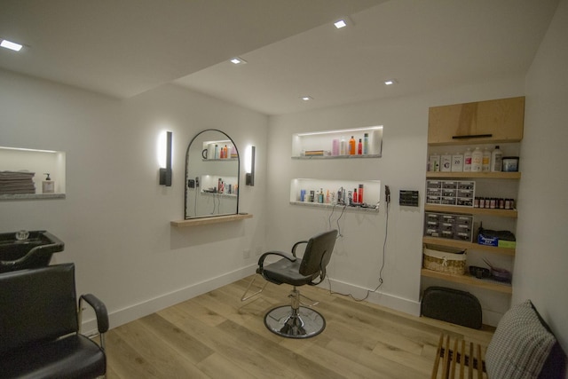 sitting room with recessed lighting, baseboards, and wood finished floors