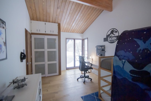 office area with beamed ceiling, light wood-style flooring, wood ceiling, and high vaulted ceiling