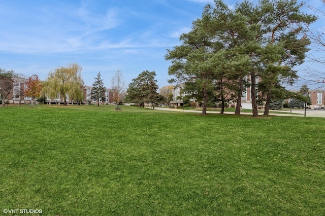 surrounding community with a lawn