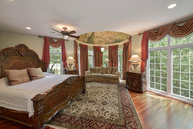 bedroom featuring recessed lighting, wood finished floors, and ceiling fan