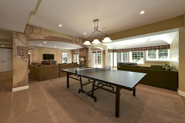 playroom featuring visible vents, recessed lighting, arched walkways, and carpet floors