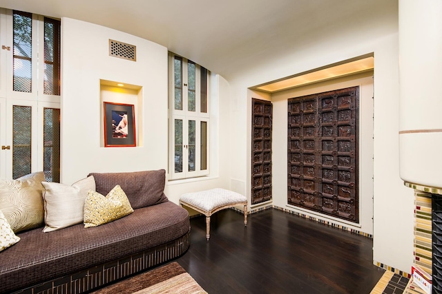 interior space with visible vents and wood finished floors