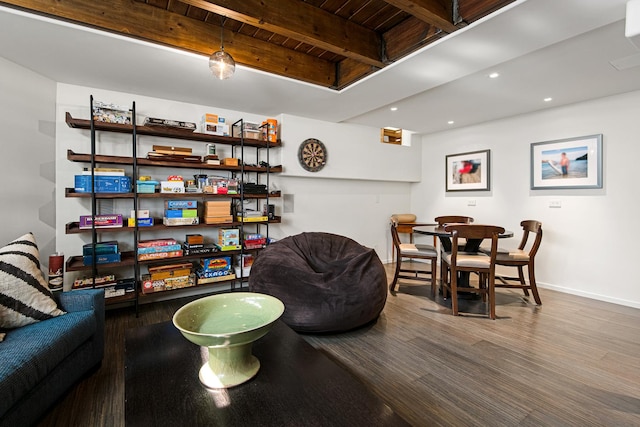 living room featuring beamed ceiling, recessed lighting, baseboards, and wood finished floors