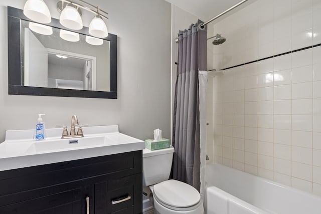 bathroom with vanity, toilet, and shower / tub combo with curtain