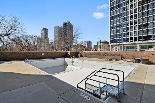 view of patio / terrace with a view of city