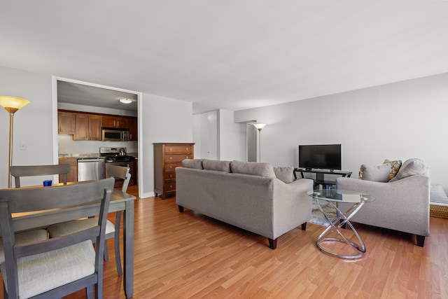 living area with light wood-style flooring