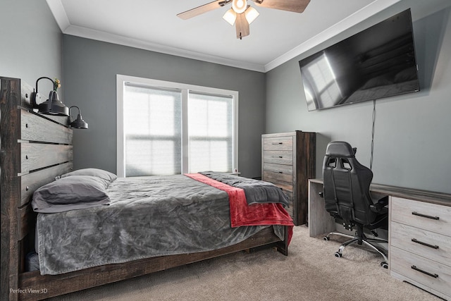 bedroom with carpet, ceiling fan, and crown molding