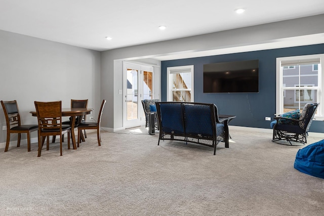 carpeted dining space featuring recessed lighting and baseboards