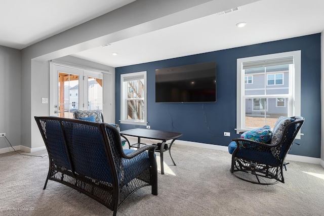 carpeted dining room with recessed lighting, visible vents, and baseboards