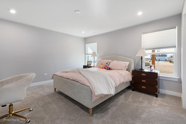 carpeted bedroom with recessed lighting and baseboards