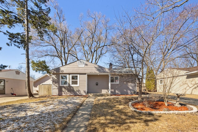 view of front of house with fence