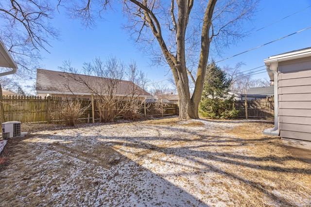 view of yard featuring cooling unit and a fenced backyard