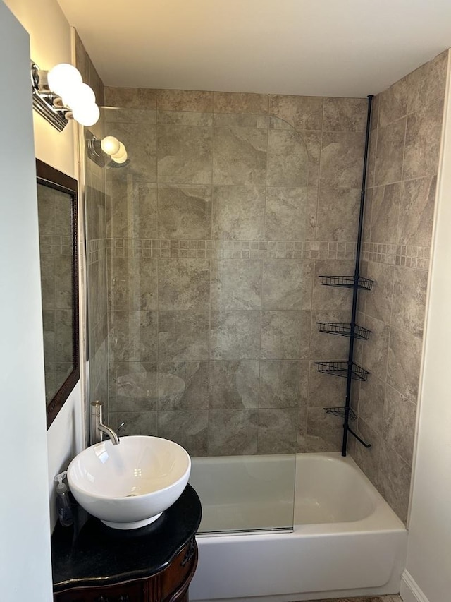 bathroom with a sink and shower / bath combination
