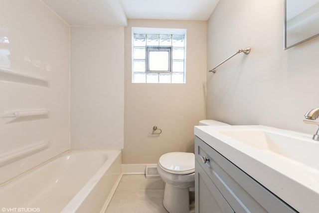 full bathroom with shower / bathtub combination, toilet, vanity, and baseboards