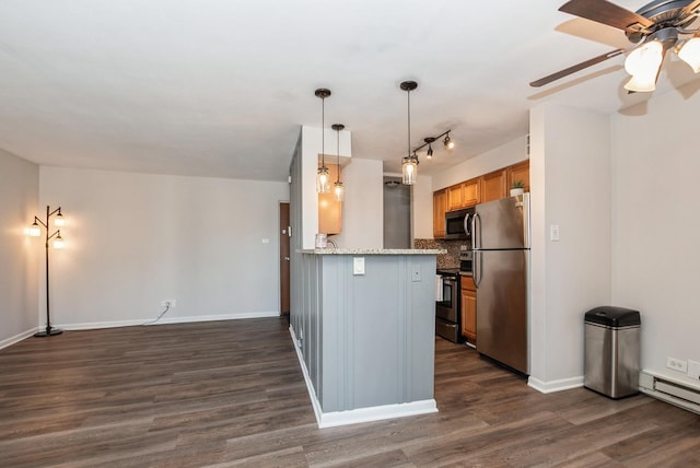 kitchen with dark wood-type flooring, tasteful backsplash, appliances with stainless steel finishes, baseboard heating, and ceiling fan