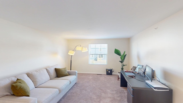 living room with light colored carpet and baseboards