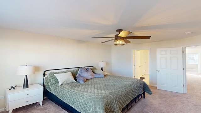 carpeted bedroom featuring a ceiling fan