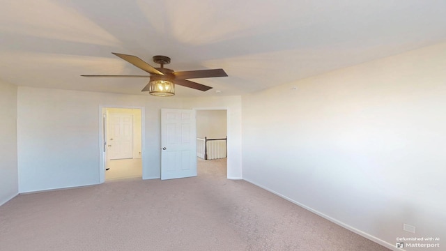 unfurnished bedroom with baseboards, carpet floors, and a ceiling fan