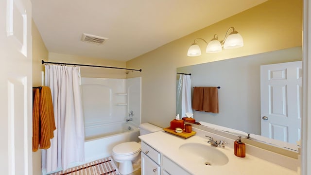 bathroom featuring visible vents, toilet, vanity, and shower / bath combination with curtain