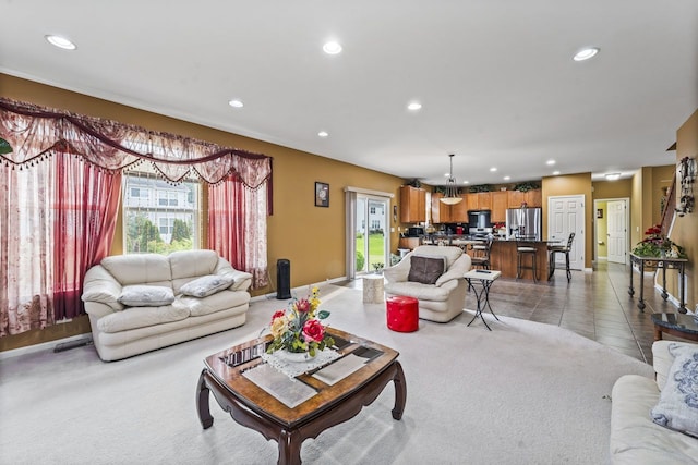 living area with light tile patterned flooring, recessed lighting, light colored carpet, and baseboards