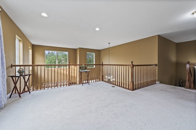 carpeted spare room featuring recessed lighting